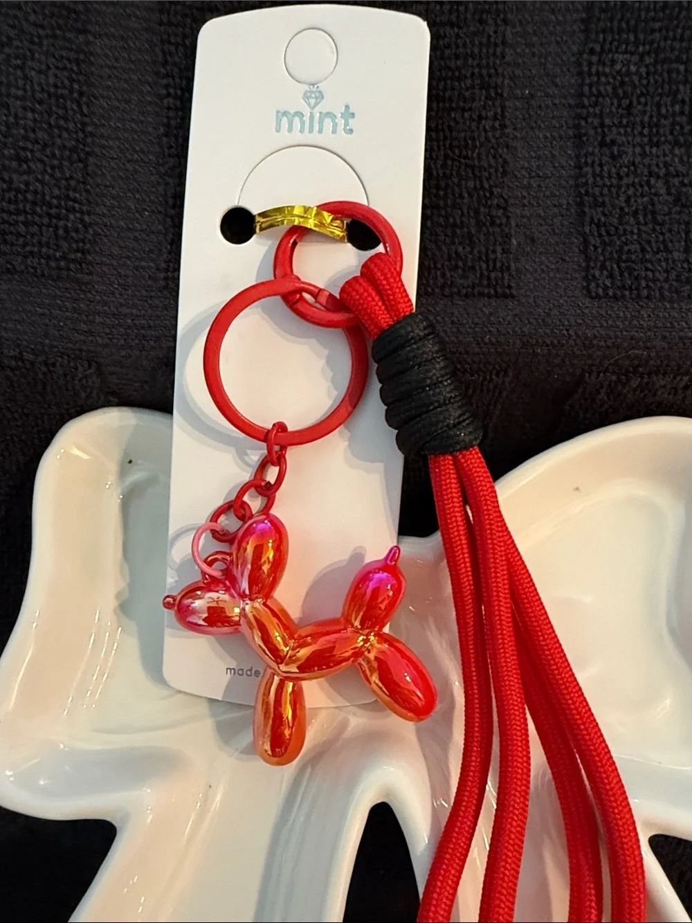Mint Red Tassel Keychain with Iridescent Orange-Pink Balloon Dog Charm